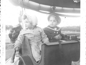 1955 May 28th, Mary & Barb on merry-go-round.jpg